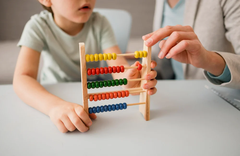 Image of a teacher with his students